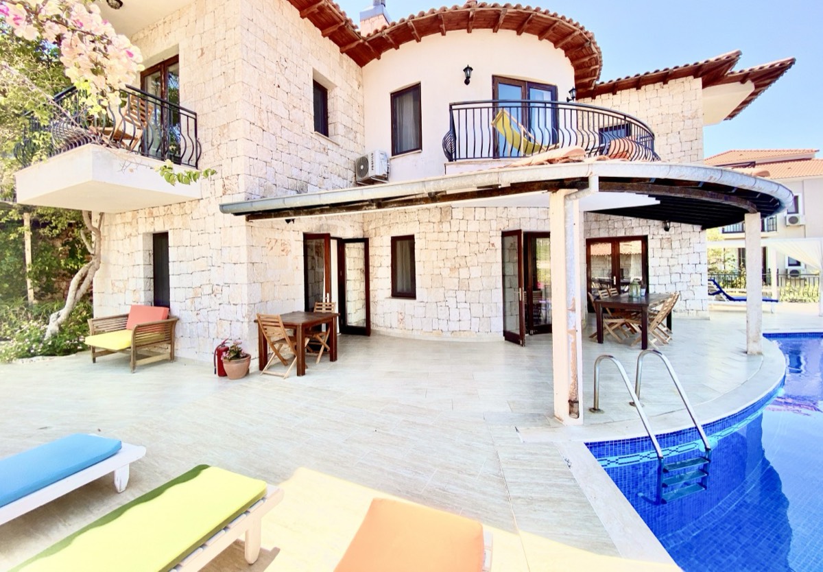 Stone facade and pool of Villa Ateş