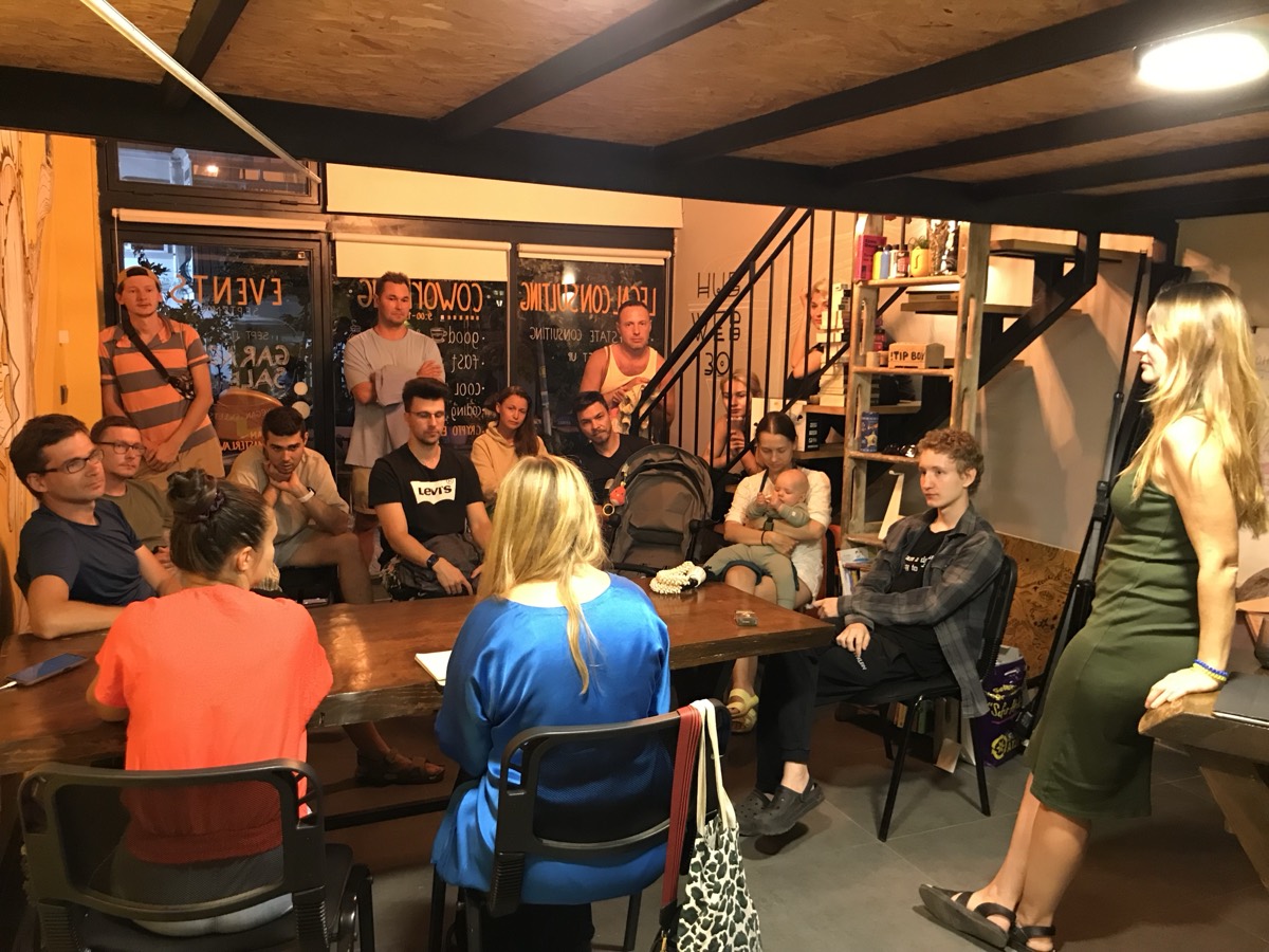 Parents and babies at a community talk