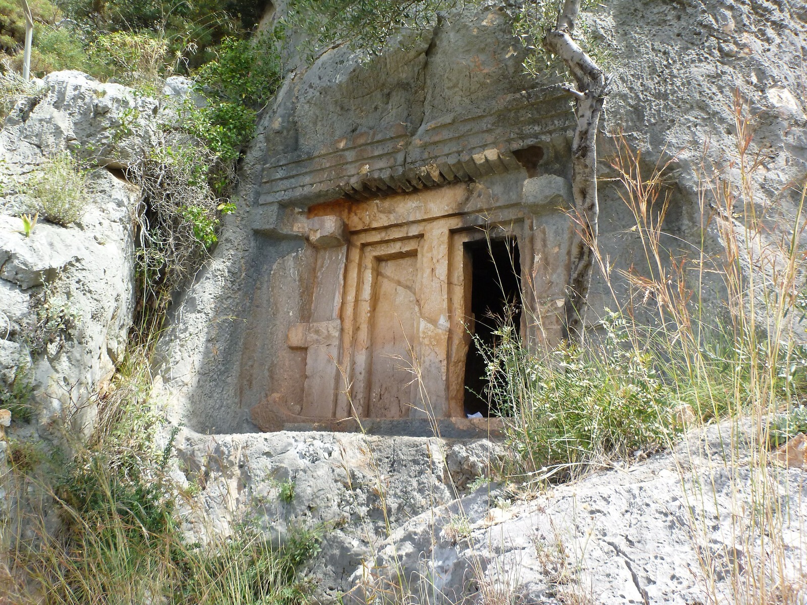 Lycian rock-cut tomb carved into the cliff at Kaş