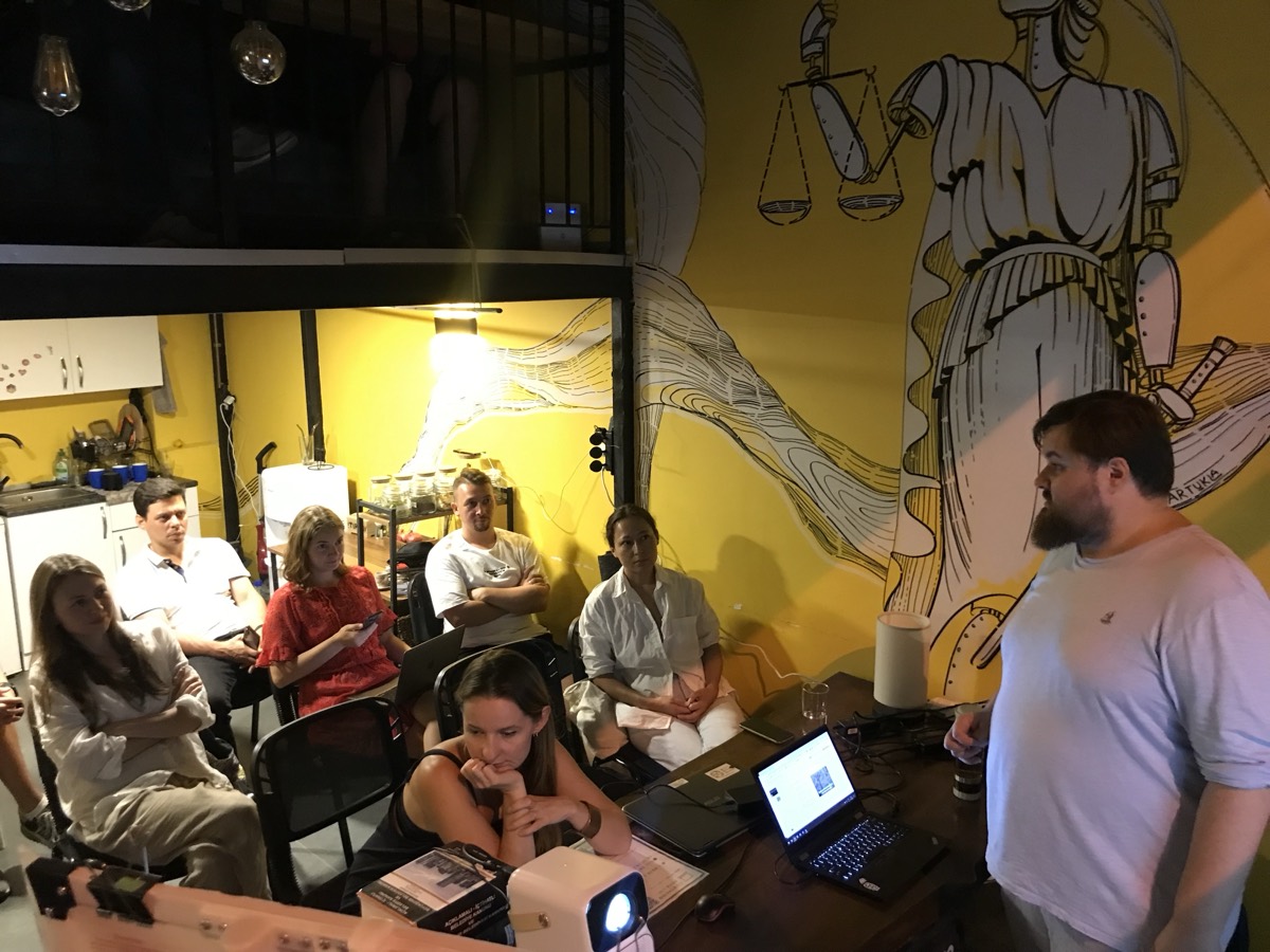 Talk under the Lycian justice mural