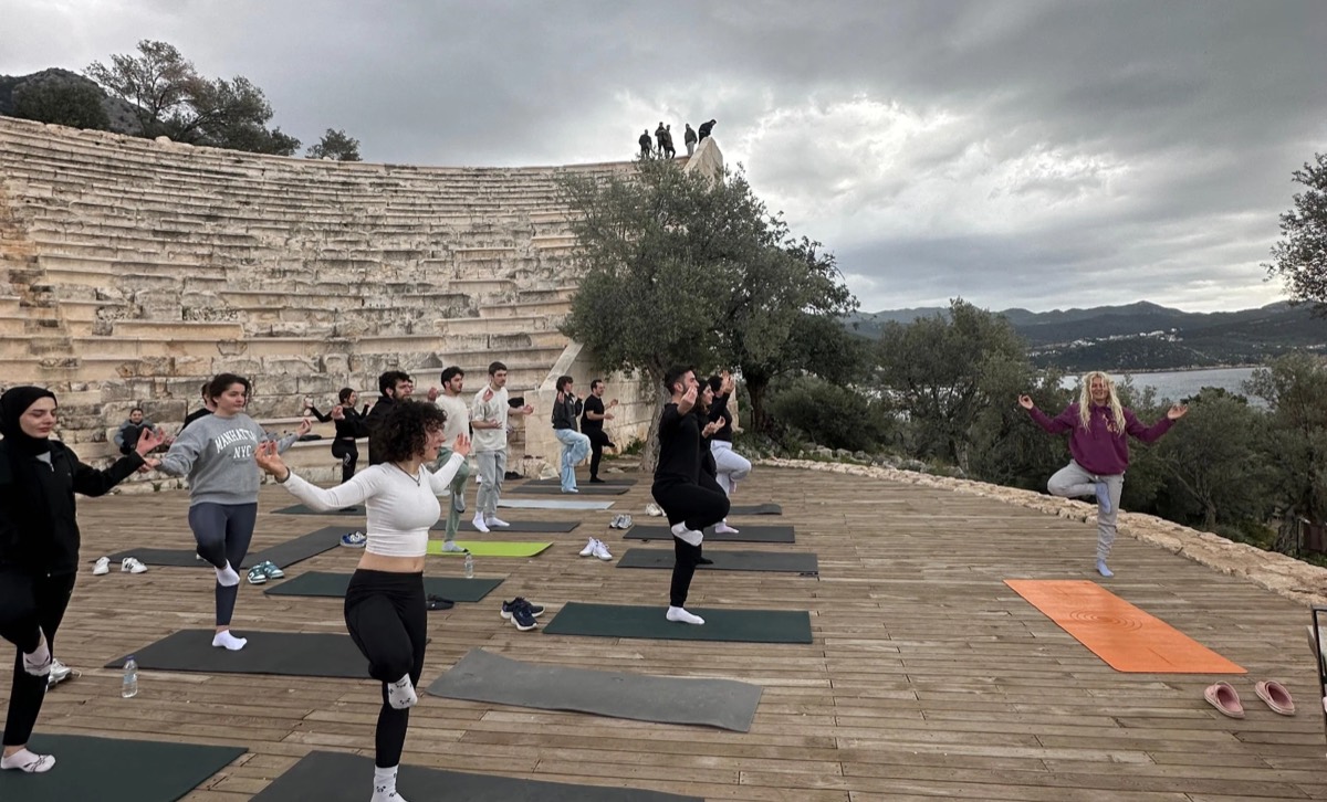 Morning yoga on the ancient theater steps